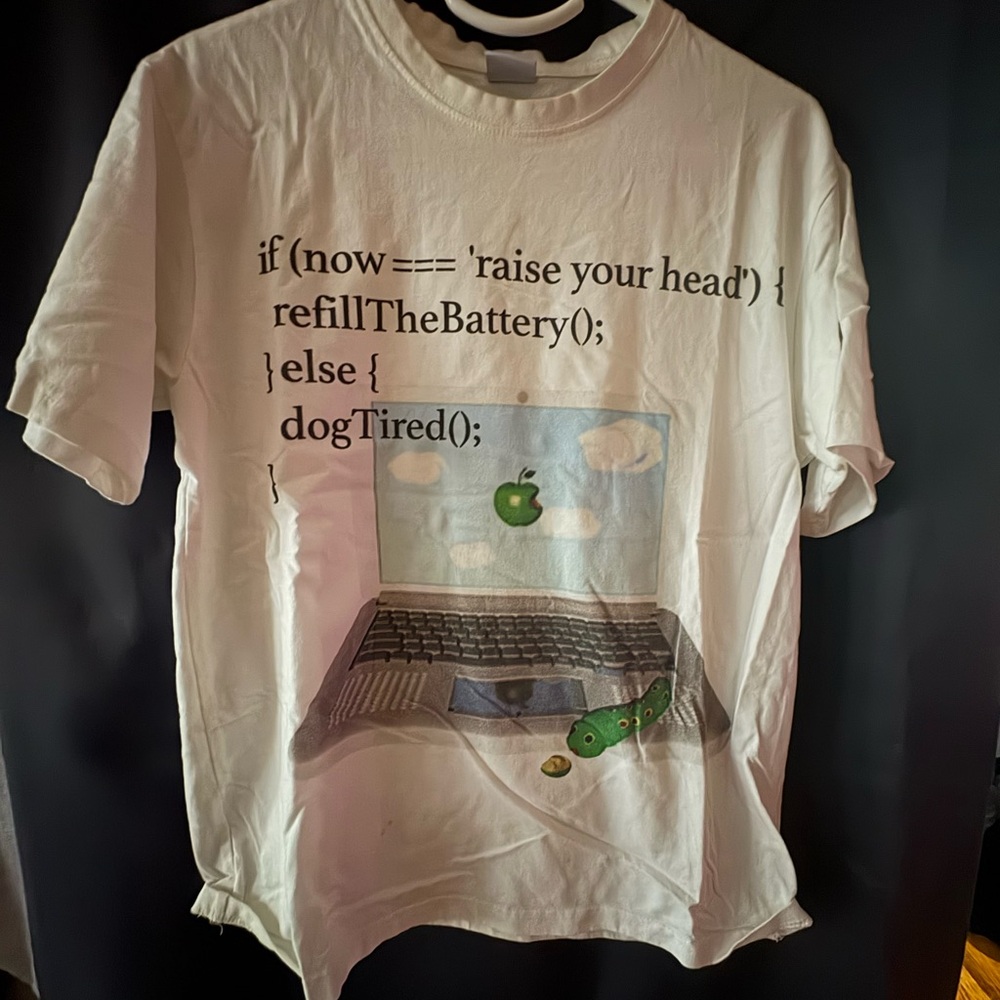 White Graphic T-Shirt with Code and Laptop Design